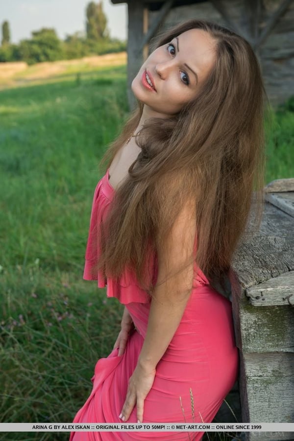 Picture by glambabes-galleries showing 'Young sweetie Arina G revealing freshly trimmed bush outdoors in the grass' number 10
