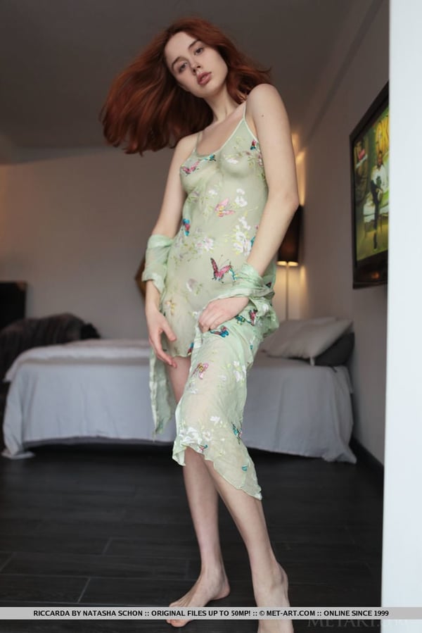 Picture by glambabes-galleries showing 'Natural redhead Riccarda slips off her sheer dress to get naked in her bedroom' number 16