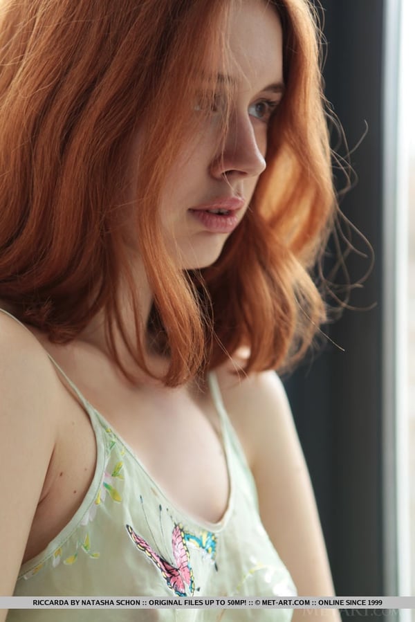 Picture by glambabes-galleries showing 'Natural redhead Riccarda slips off her sheer dress to get naked in her bedroom' number 14