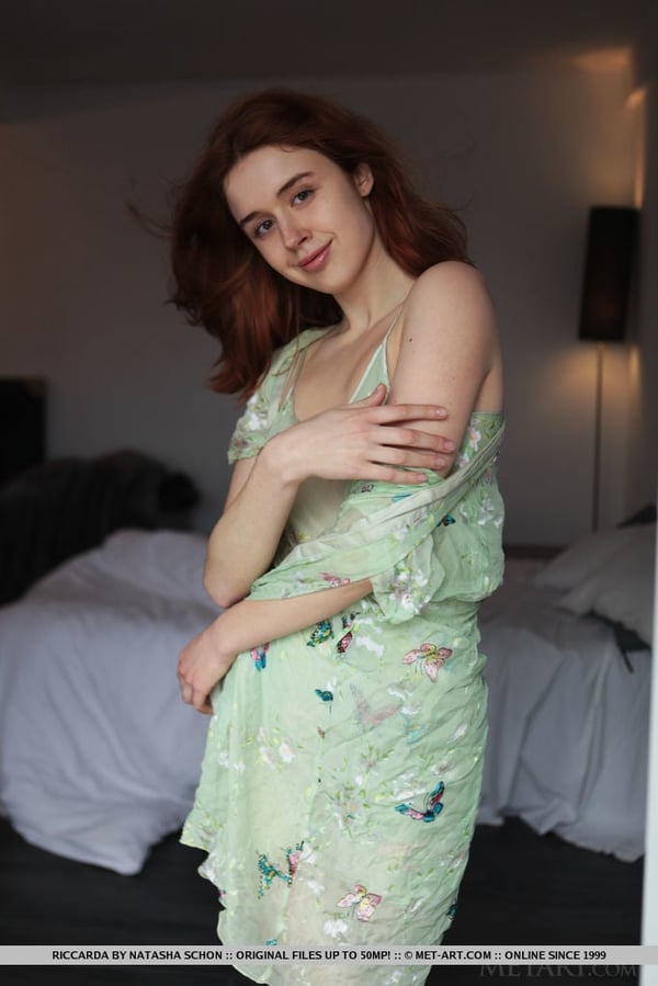Picture by glambabes-galleries showing 'Natural redhead Riccarda slips off her sheer dress to get naked in her bedroom' number 13