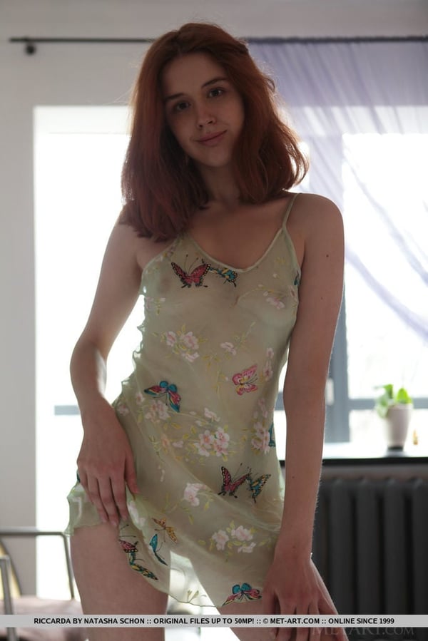 Picture by glambabes-galleries showing 'Natural redhead Riccarda slips off her sheer dress to get naked in her bedroom' number 12