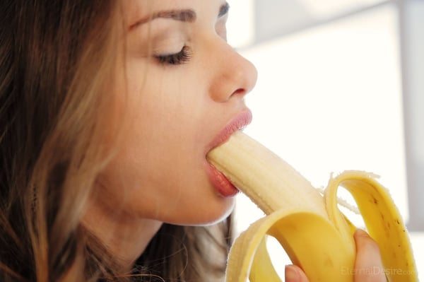 Picture by glambabes-galleries showing 'Gorgeous teen Loretta A eats a banana while totally naked on a counter' number 14