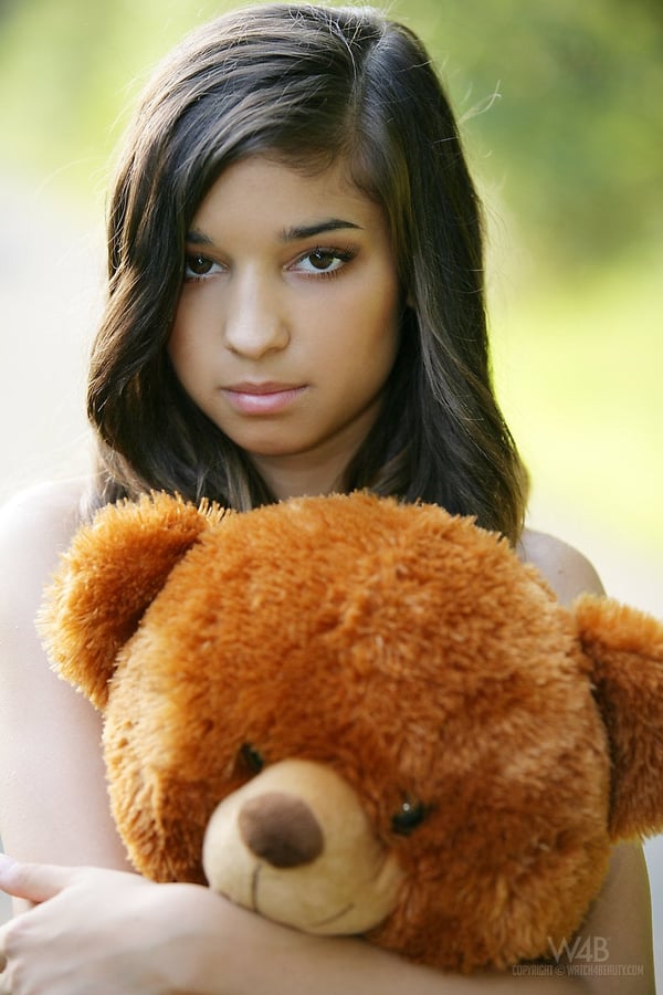 Picture by glambabes-galleries showing 'Young looking teen Nika poses naked on a road with a stuffed bear' number 4