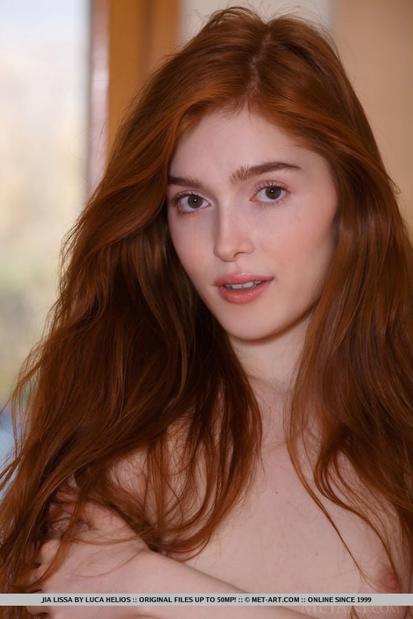 Picture by glambabes-galleries showing 'Redhead teen Jia Lissa shows her landing strip pussy in fetish clothing' number 1