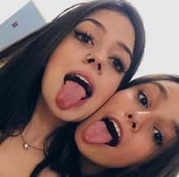 Two hotties tongue out