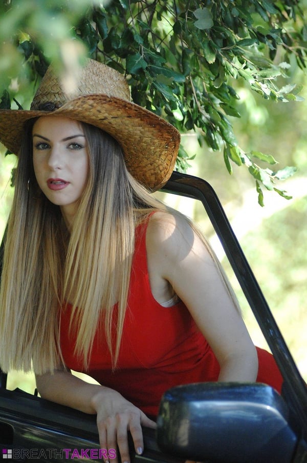 Picture by glambabes-galleries showing 'Glamour model Stella Cox removes her cowgirl attire until she's nakd' number 6