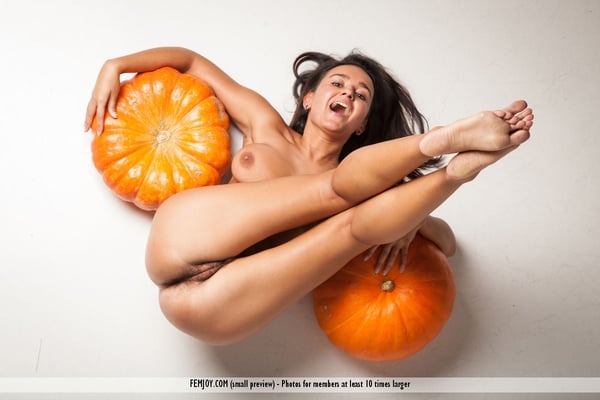 Picture by glambabes-galleries showing 'Naked brunette Sanita spreading naked with her pumpkins to show hairy beaver' number 15