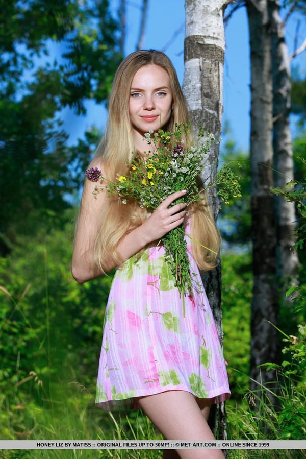 Picture by glambabes-galleries showing 'Sweet teen girl puts down her flowers and proceeds to model in the nude' number 17