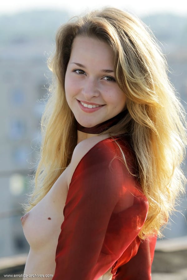 Picture by glambabes-galleries showing 'Sweet teen model Angela flaunts her beauty atop apartment building' number 12