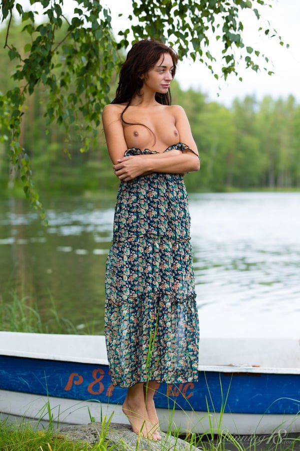 Picture by glambabes-galleries showing 'Cute teen Dolores M displays her hot pussy and tits by the lake' number 14
