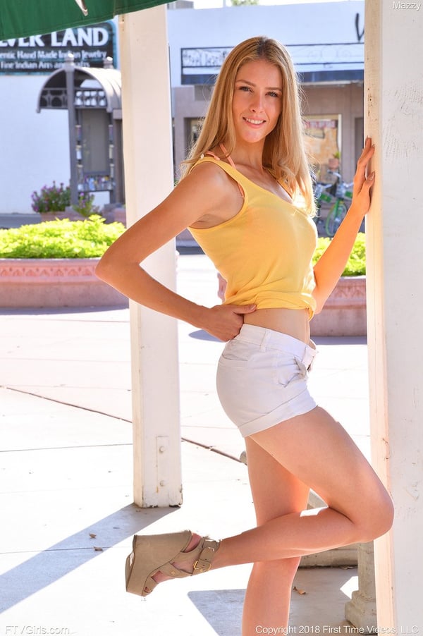 Picture by glambabes-galleries showing 'Slender amateur Mazzy poses in white shorts and teases in public' number 20