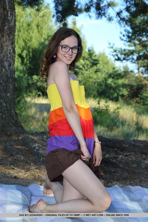Picture by glambabes-galleries showing 'Nerdy brunette Ava keeps her glasses on while getting naked on picnic blanket' number 17
