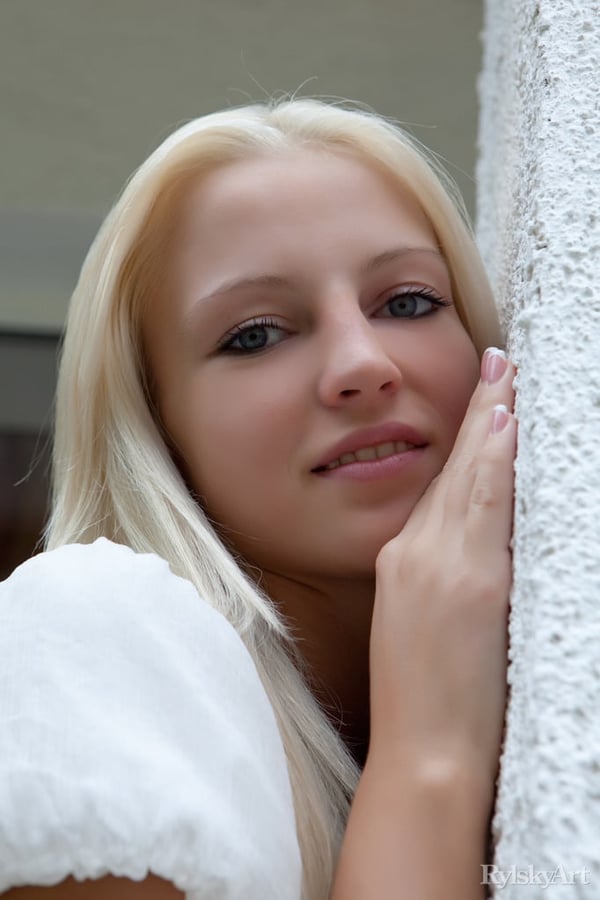 Picture by glambabes-galleries showing 'Innocent blonde teen from Estonia frees her girl parts from her white dress' number 13