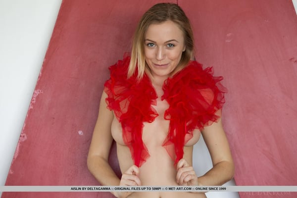 Picture by glambabes-galleries showing 'Topless teen Aislin removes a red tutu to model totally naked' number 12