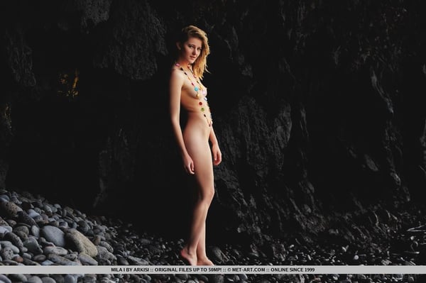 Naked teen Mila I strikes great solo poses while on seaside rocks