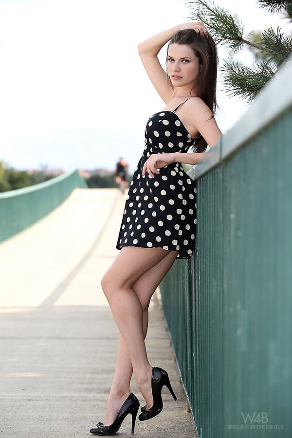 Picture by glambabes-galleries showing 'Solo girl removes her polka dot dress while out for a walk in public' number 1