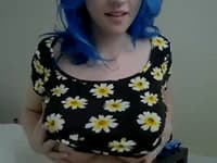 Picture showing Blue-Haired Woman with Huge Tits