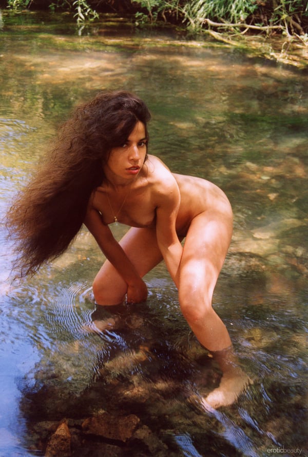Picture by glambabes-galleries showing 'Skinny nude girl with long bulky hair named Idoia A poses in nature' number 7