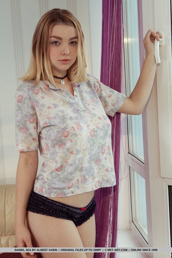 Picture by glambabes-galleries showing 'Dirty blond teen Daniel Sea unveils nice tits before displaying her yummy twat' number 17