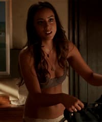 Picture showing Chloe Bennet getting dressed