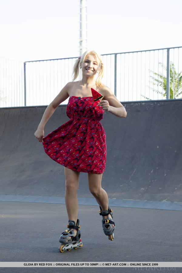 Picture by glambabes-galleries showing 'Young blonde Gloia shows her tits and bald slit at a skateboard park' number 15
