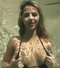 Picture showing Hot babe showing tits underwater