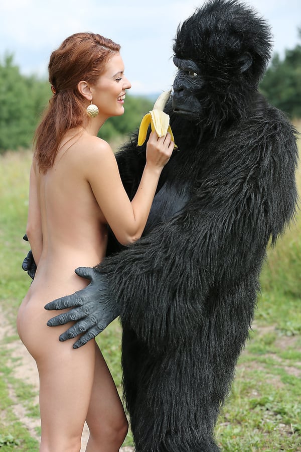 Picture by glambabes-galleries showing 'Sexy redhead cosplay chick Becca romps nude outdoors in heels with gorilla' number 10