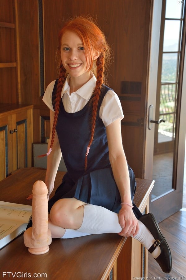 Picture by glambabes-galleries showing 'Ginger schoolgirl Dolly inserts a huge fake cock & Ben Wa balls into her pussy' number 16